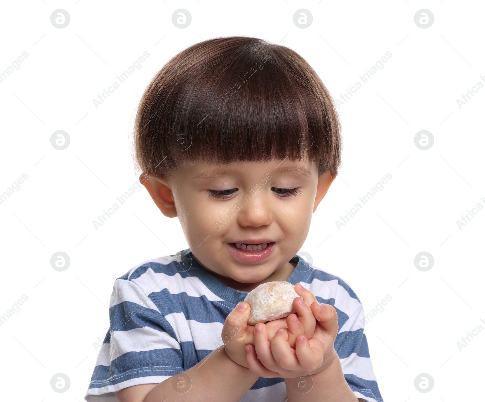 Photo of Cute little child with tasty mochi on white background