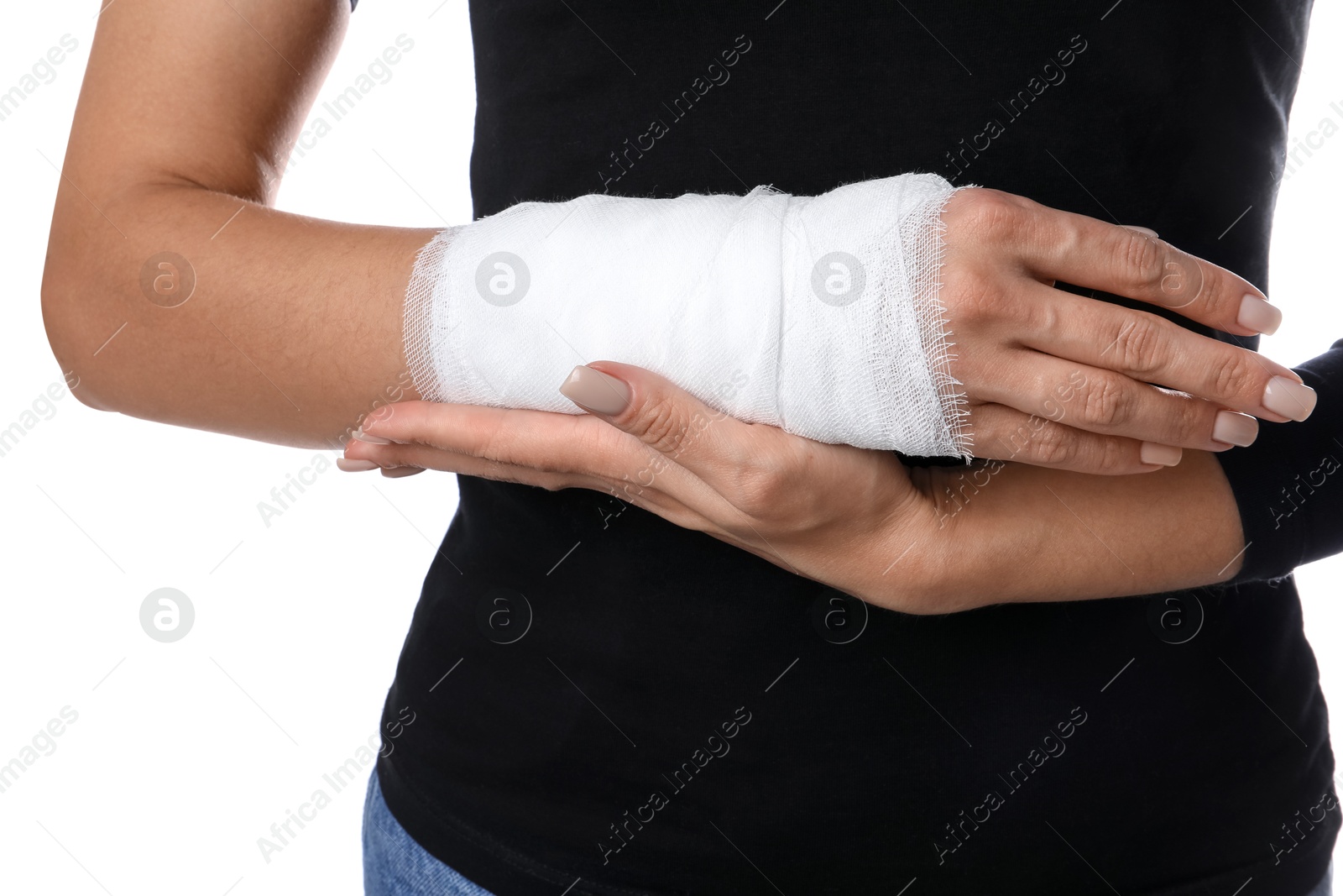 Photo of Woman with medical bandage on wrist against white background, closeup