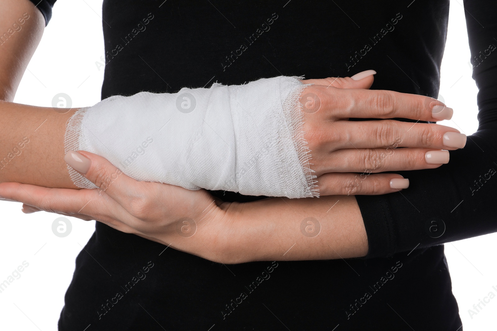 Photo of Woman with medical bandage on wrist against white background, closeup