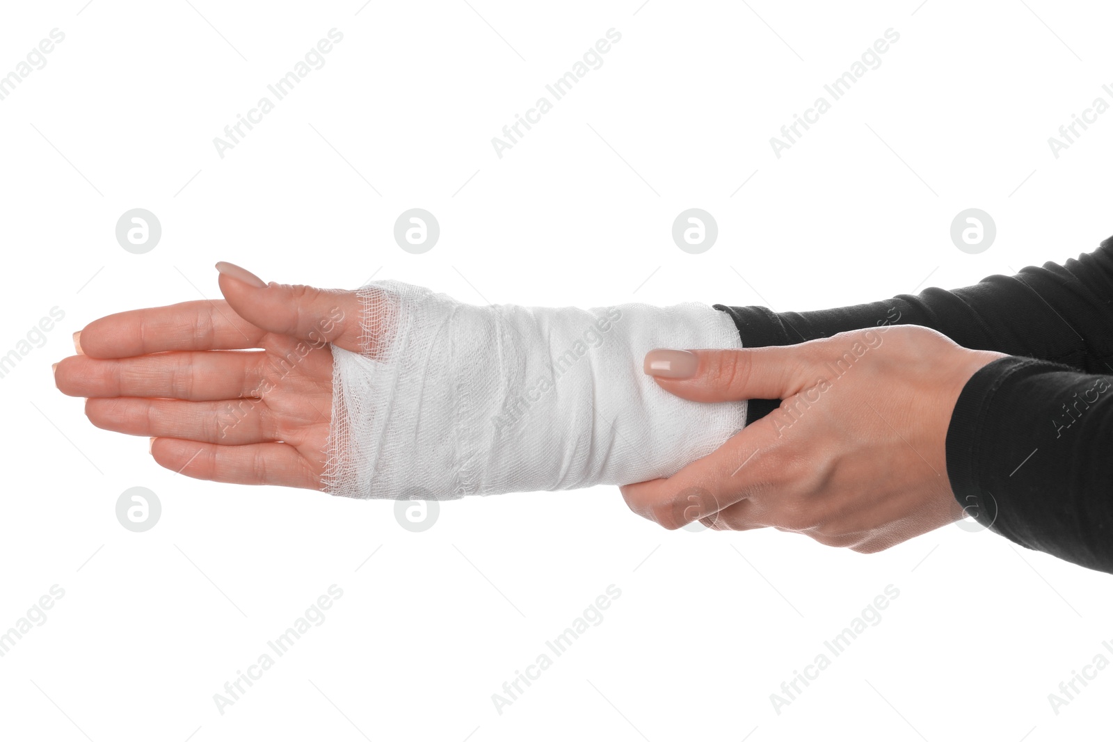 Photo of Woman with medical bandage on wrist against white background, closeup