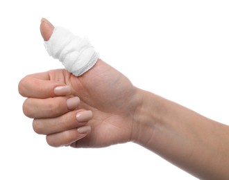 Photo of Woman with medical bandage on finger showing thumbs up against white background, closeup