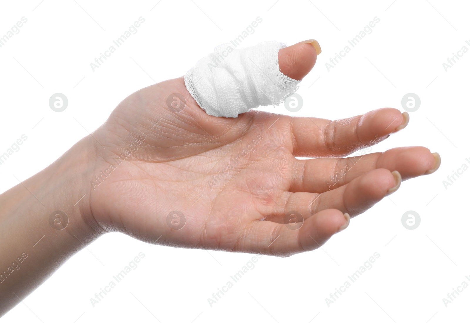 Photo of Woman with medical bandage on finger against white background, closeup