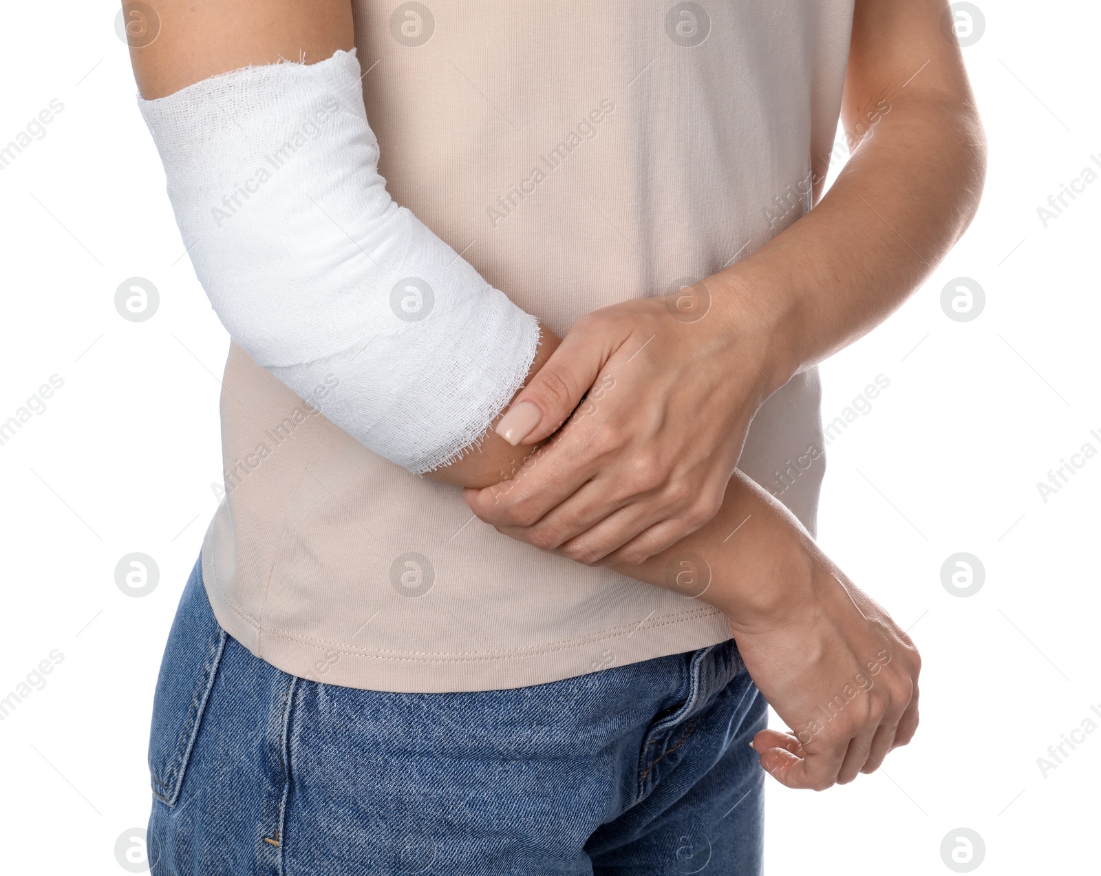 Photo of Woman with medical bandage on elbow against white background, closeup