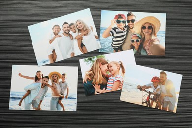 Photo of Different family photos on black wooden table, flat lay