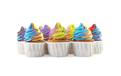 Photo of Tasty cupcakes with colorful cream isolated on white