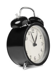 Photo of One black alarm clock isolated on white