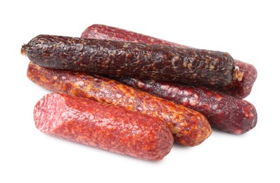 Photo of Many different smoked sausages isolated on white