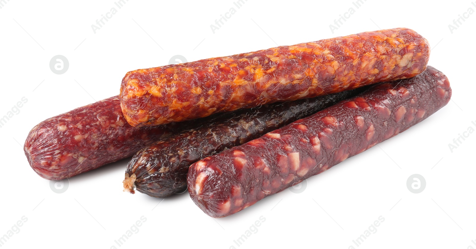 Photo of Many different dry cured sausages isolated on white