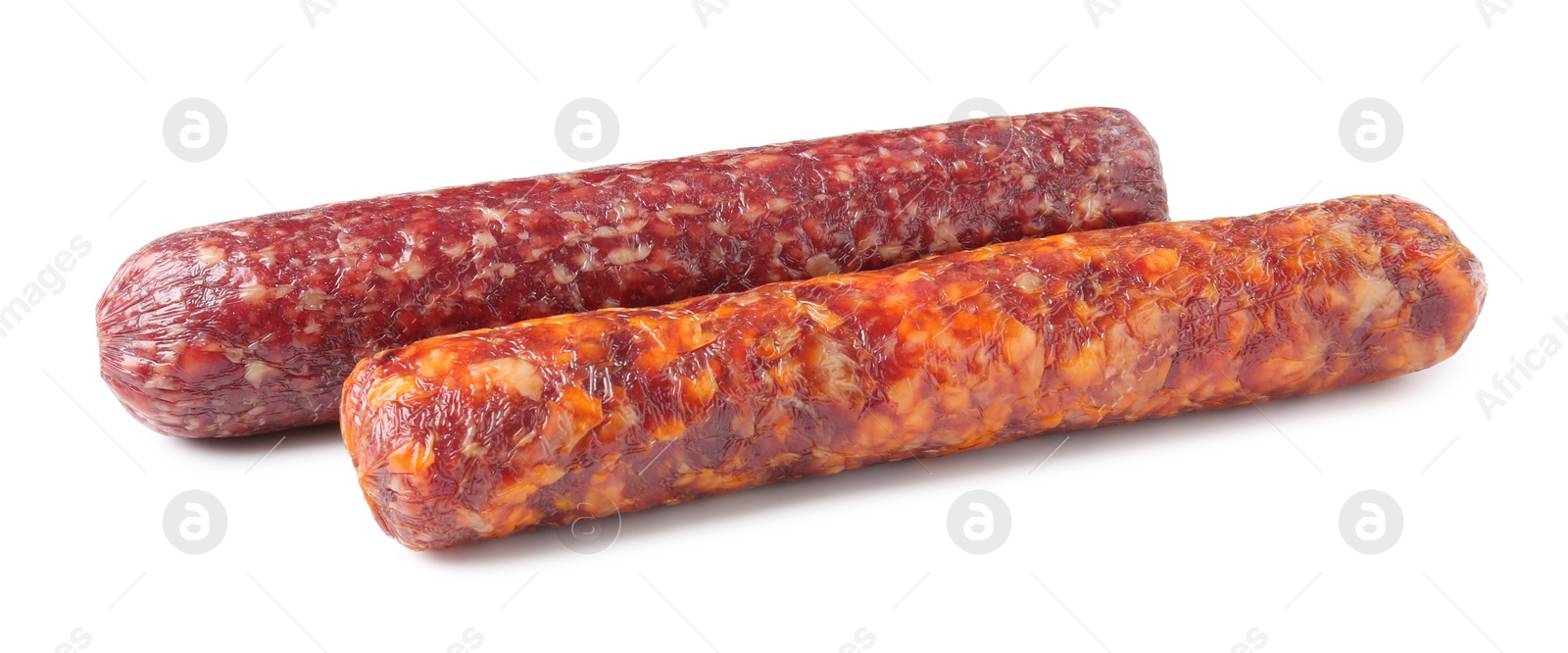 Photo of Delicious dry cured sausages isolated on white