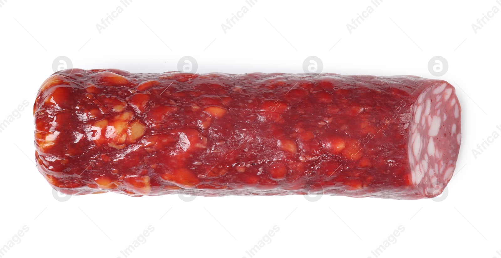 Photo of Piece of delicious dry cured sausage isolated on white, top view