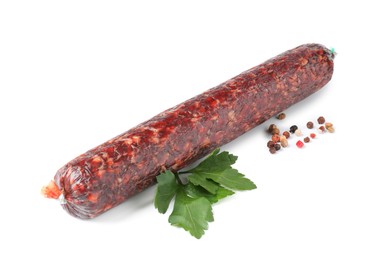 Photo of Delicious dry cured sausage with peppercorns and parsley isolated on white