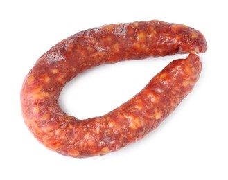 Photo of Delicious dry cured sausage isolated on white, top view