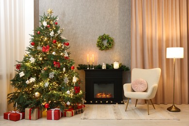 Cozy room with Christmas tree, fireplace and armchair. Interior design for holiday