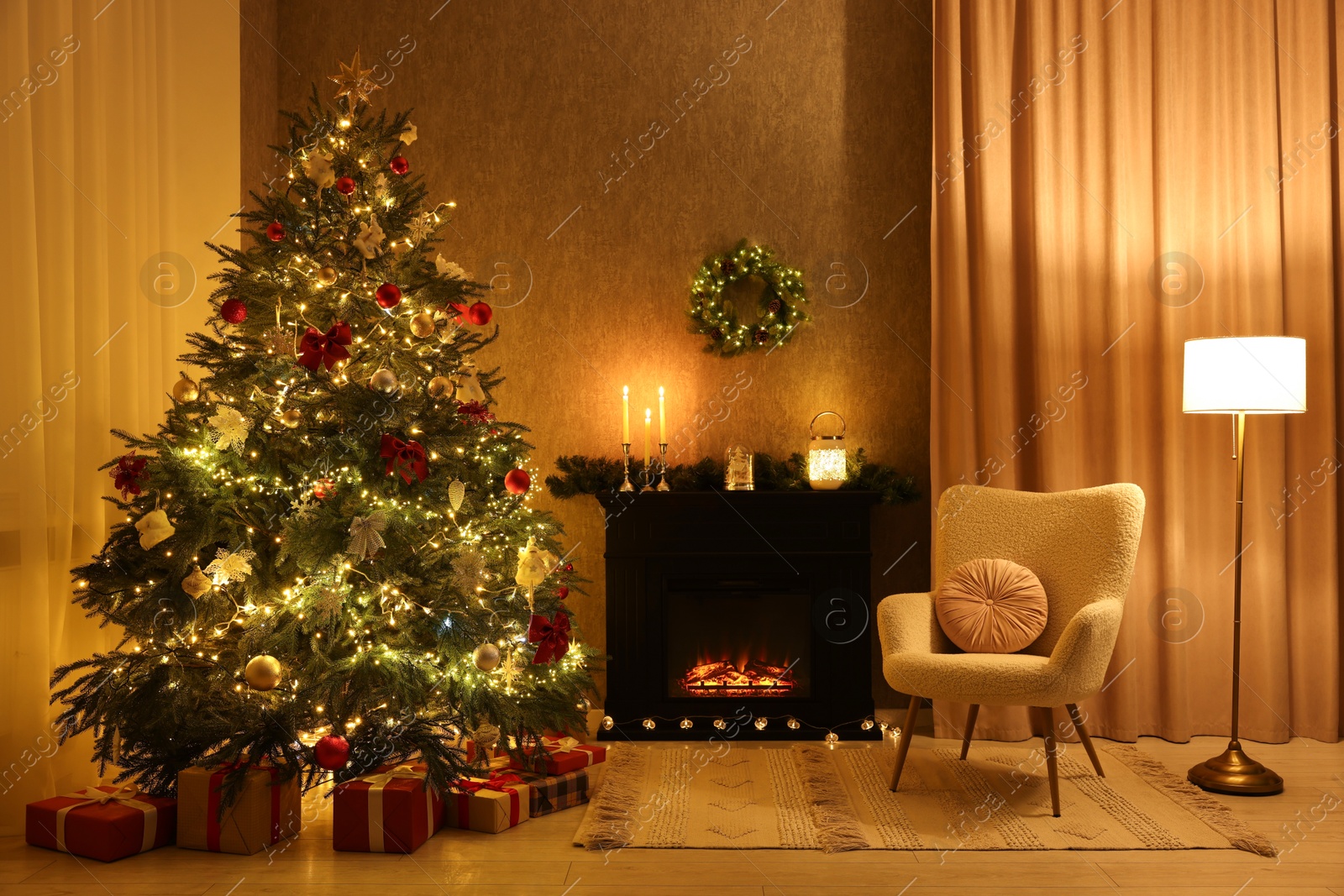 Photo of Cozy room with Christmas tree, fireplace and armchair. Interior design for holiday