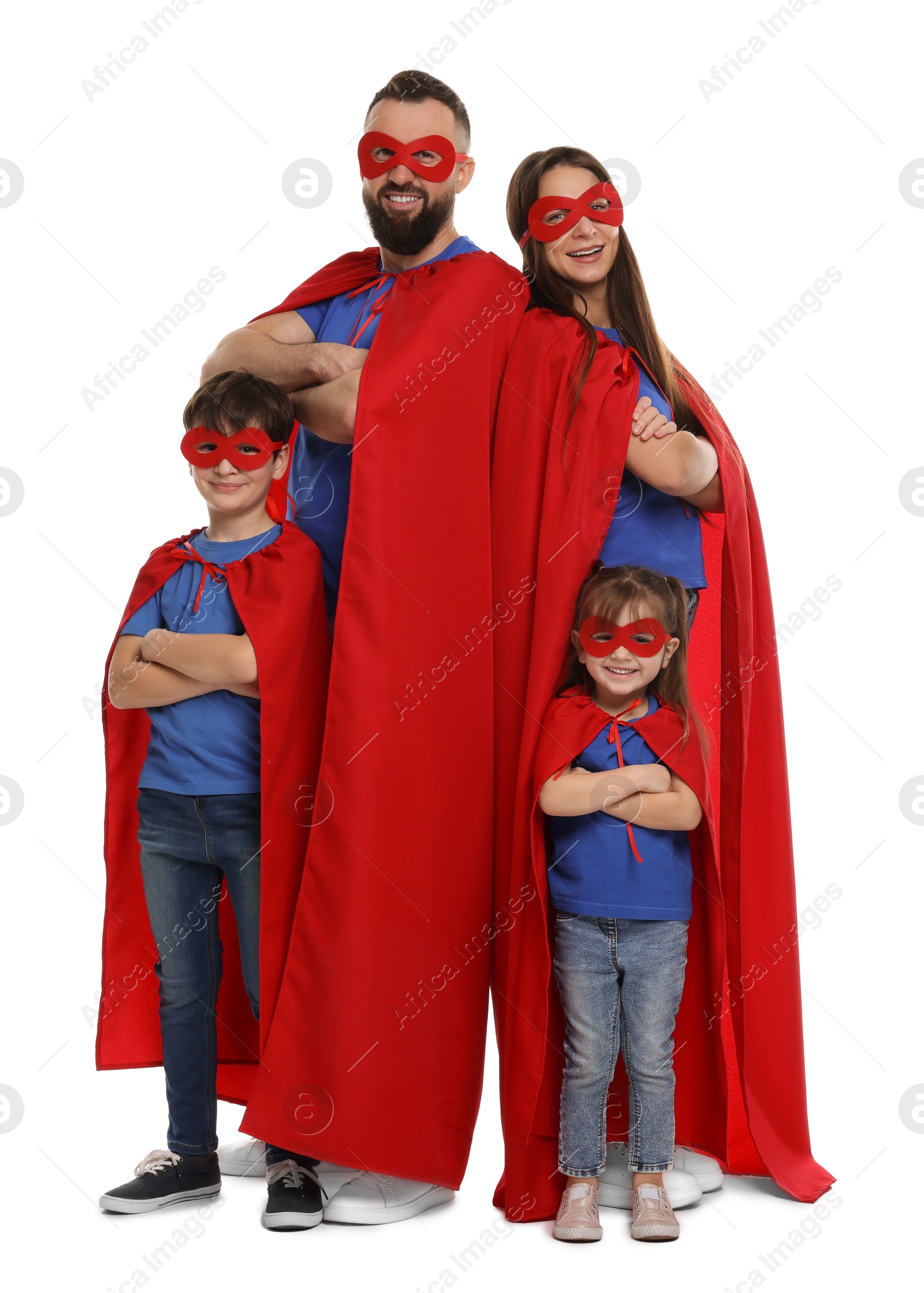 Photo of Parents and their children wearing superhero costumes on white background