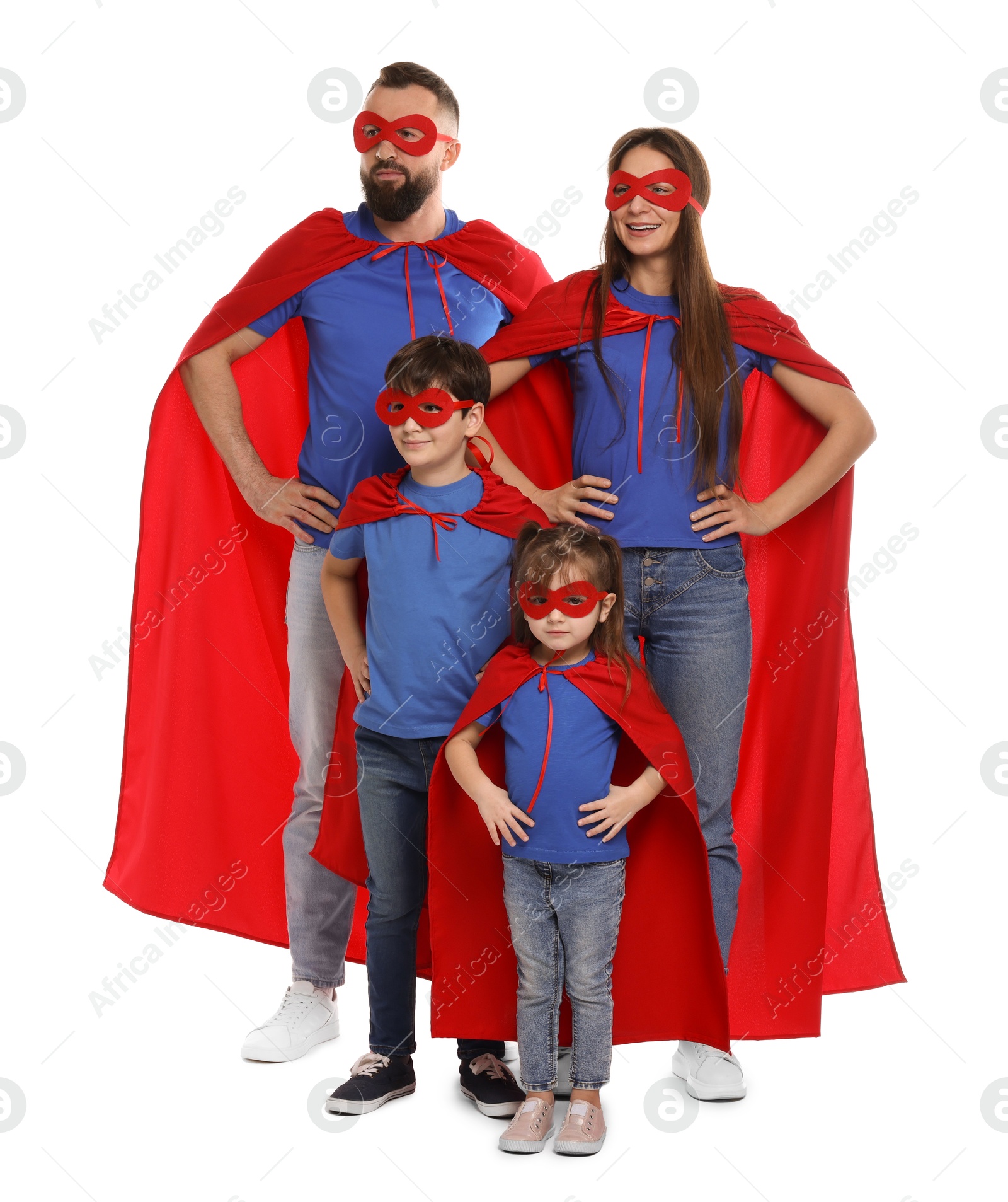 Photo of Parents and their children wearing superhero costumes on white background