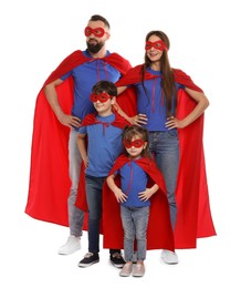 Photo of Parents and their children wearing superhero costumes on white background