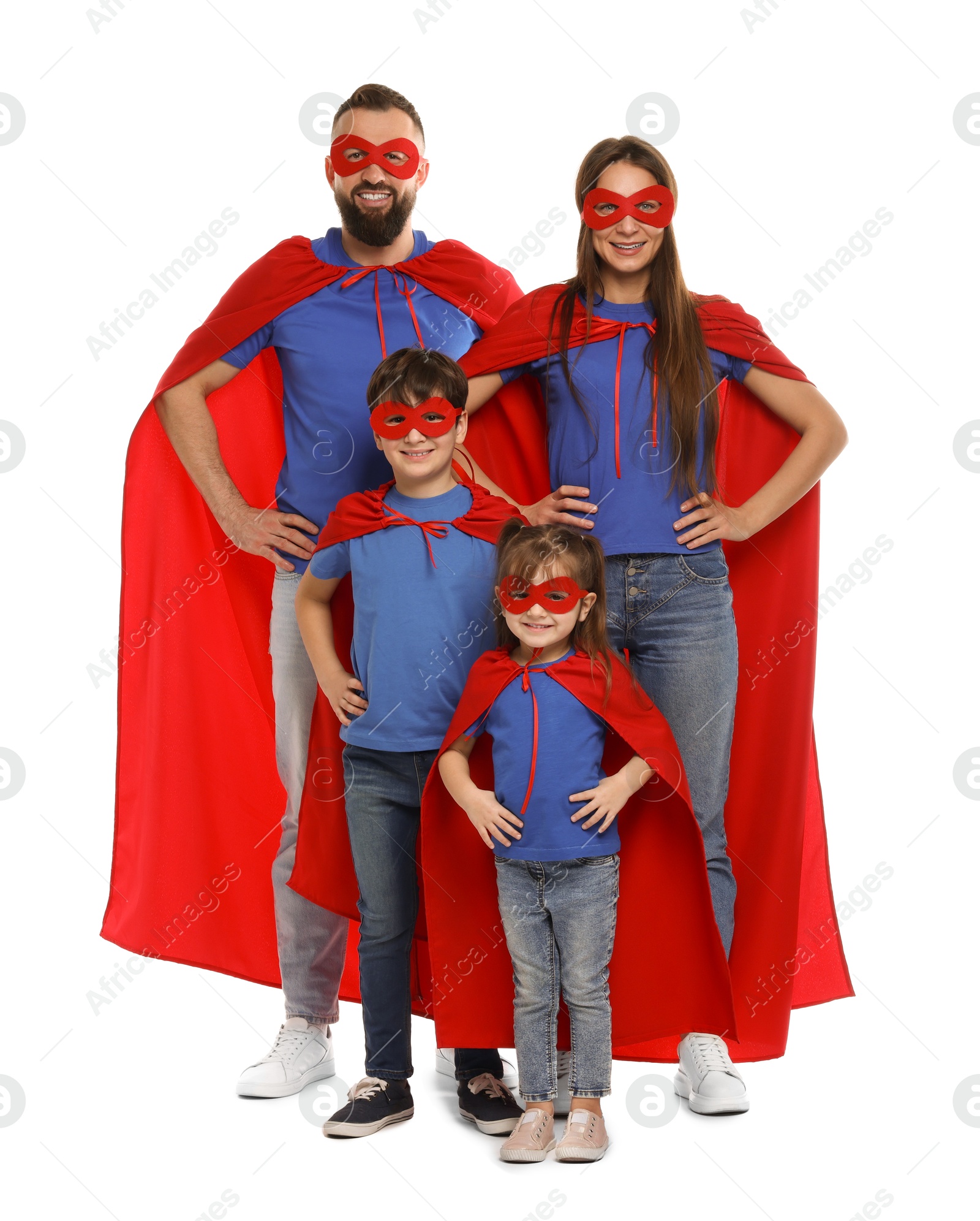 Photo of Parents and their children wearing superhero costumes on white background