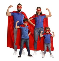 Photo of Parents and their children wearing superhero costumes on white background