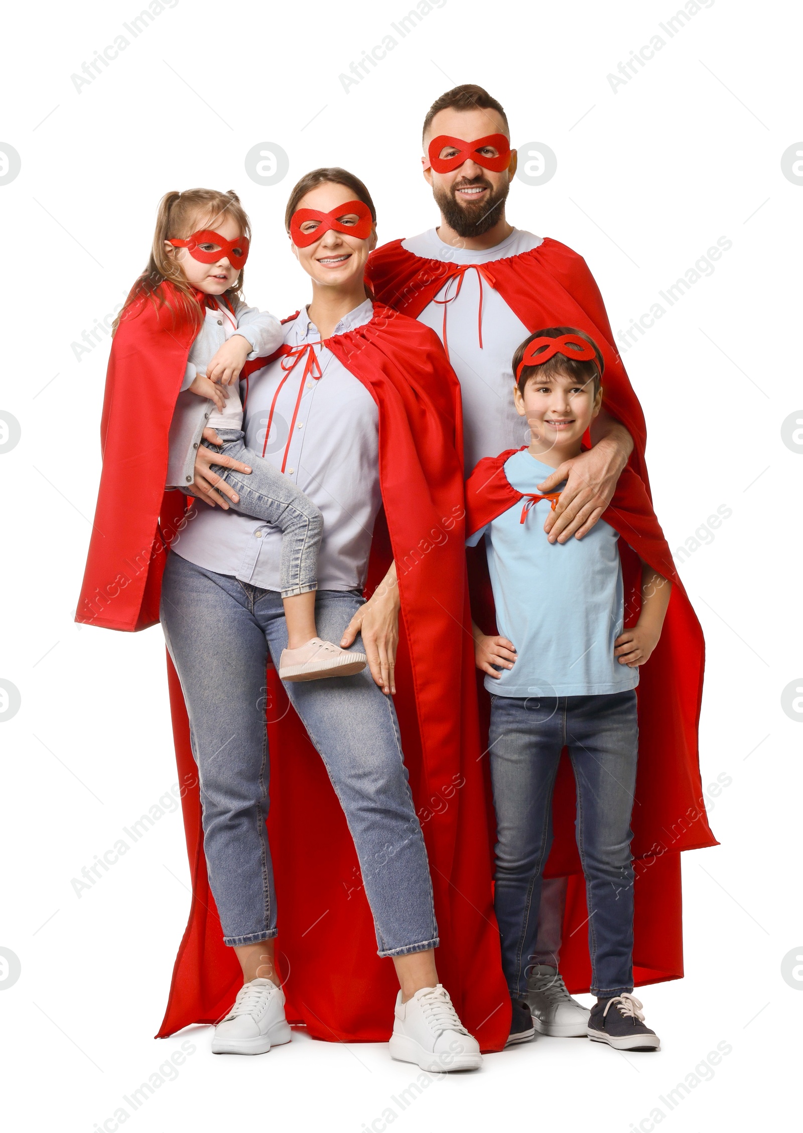 Photo of Parents and their children wearing superhero costumes on white background