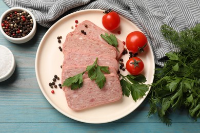 Photo of Pieces of tasty canned meat, parsley, peppercorns and tomatoes on light blue wooden table, flat lay