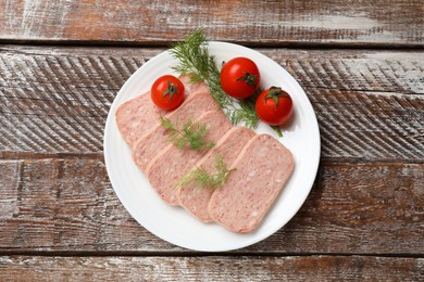 Photo of Tasty canned meat, tomatoes and dill on wooden table, top view