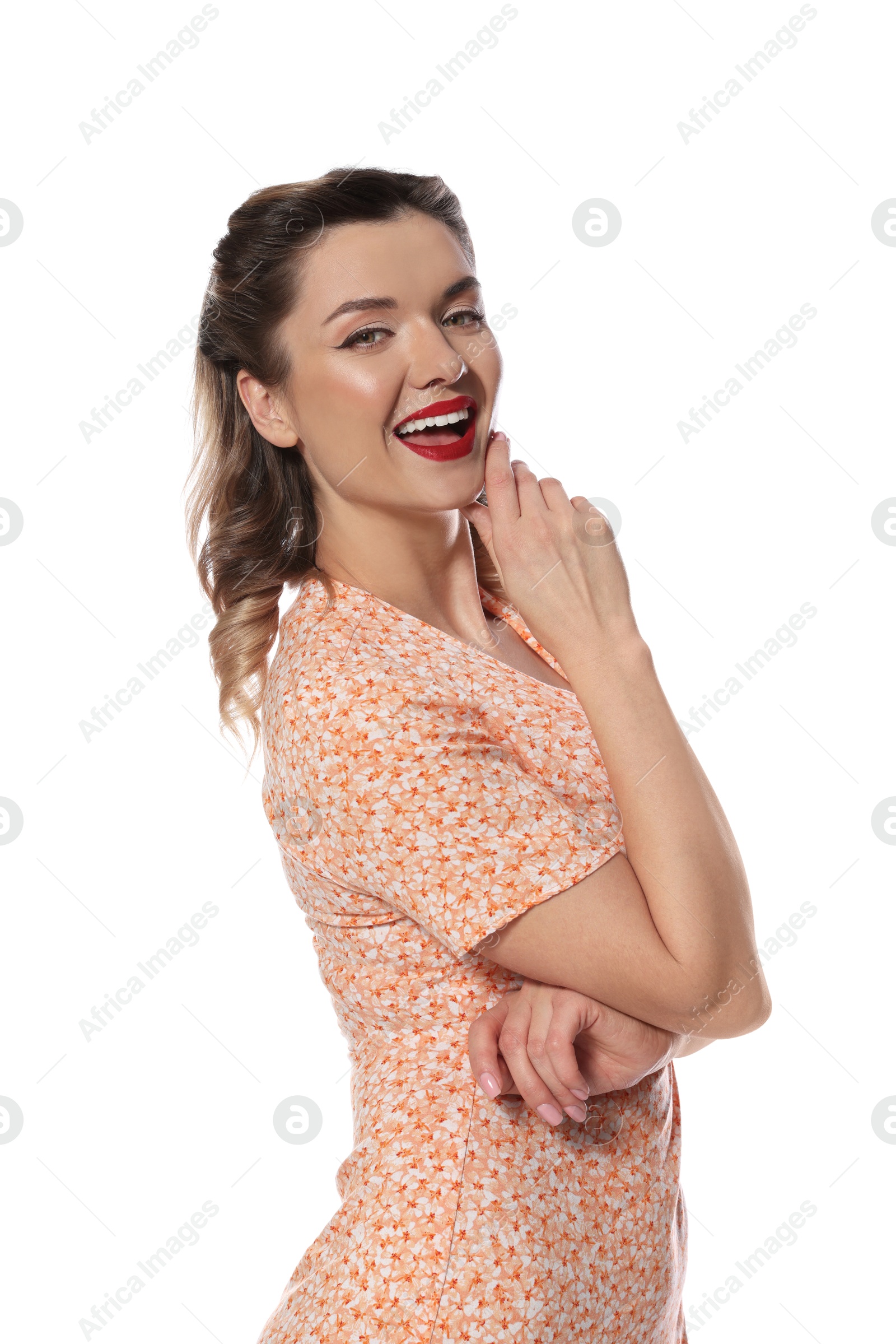 Photo of Happy pin-up woman posing on white background