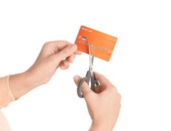 Photo of Woman cutting credit card on white background, closeup