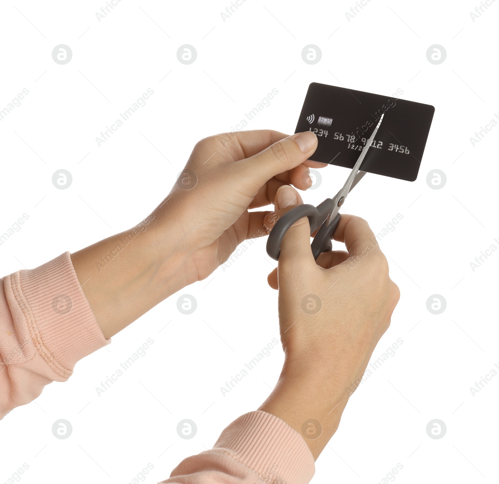 Photo of Woman cutting credit card on white background, closeup