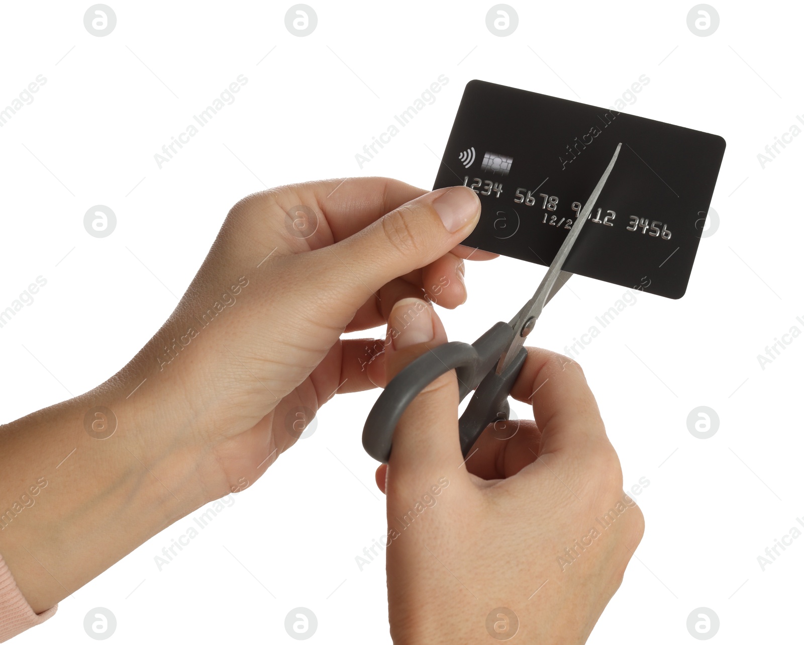 Photo of Woman cutting credit card on white background, closeup