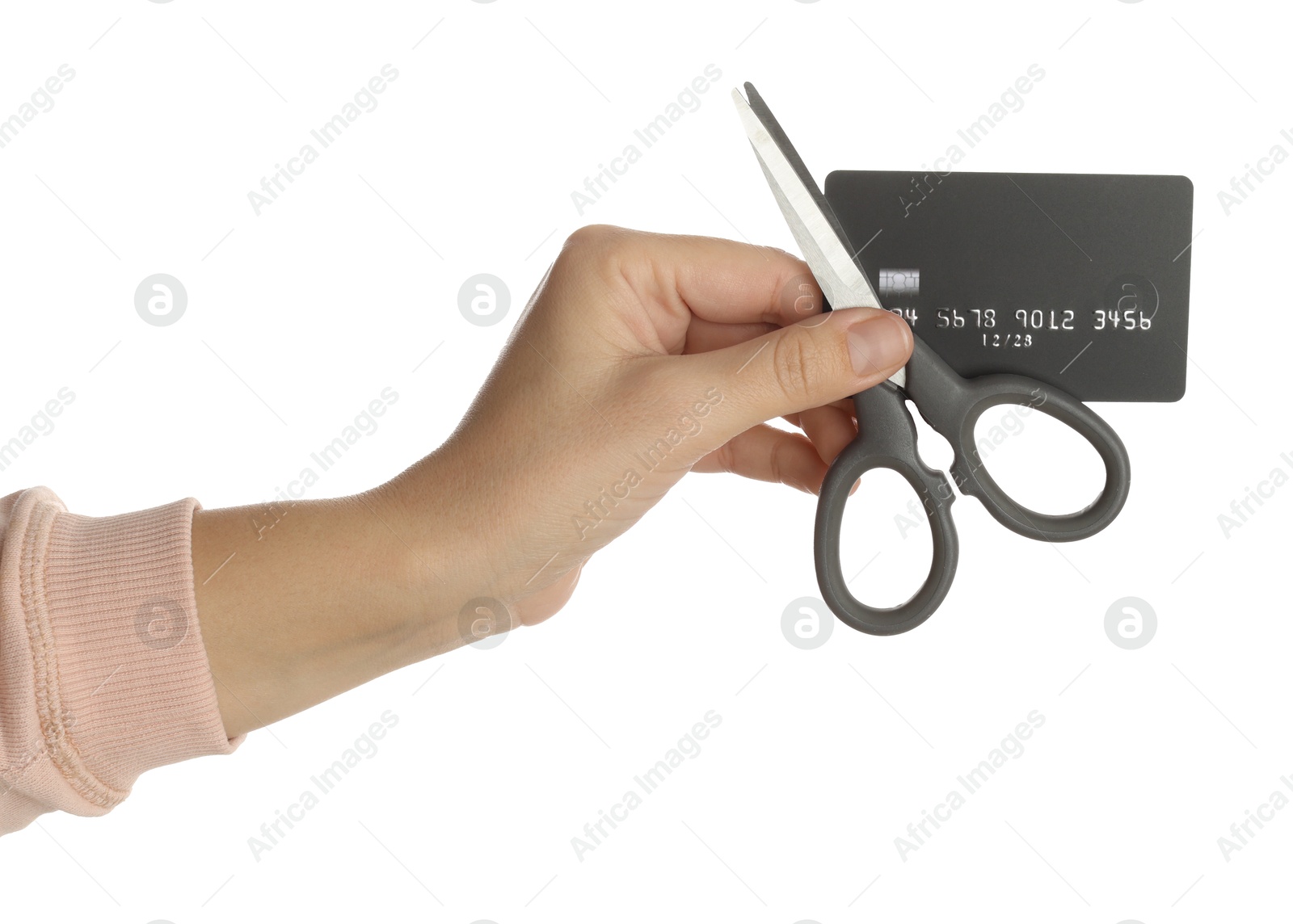 Photo of Woman with credit card and scissors on white background, closeup