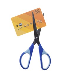 Photo of Credit card and scissors isolated on white