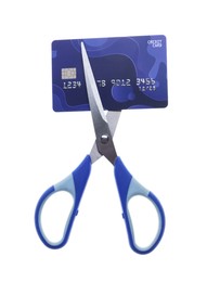 Photo of Credit card and scissors isolated on white