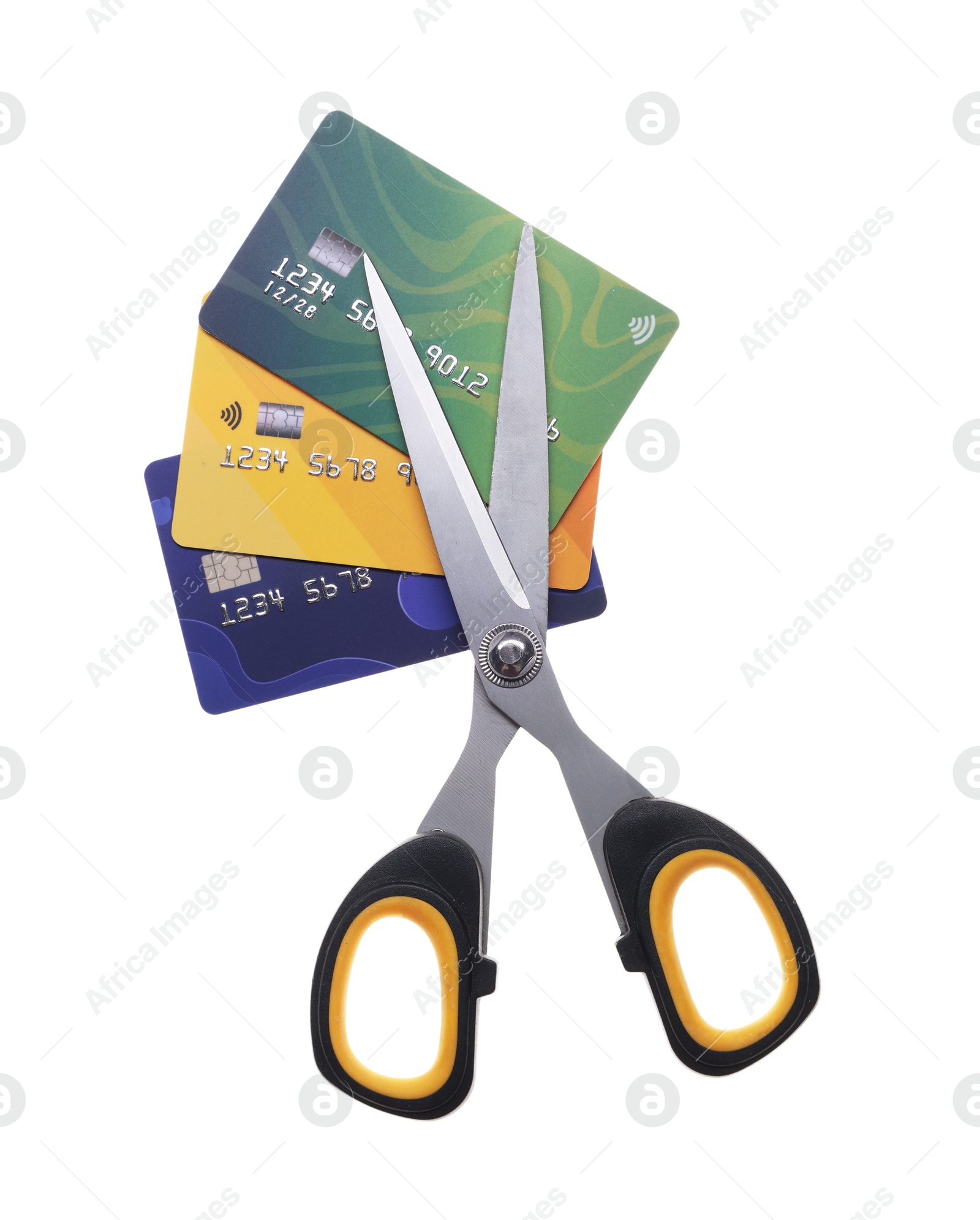 Photo of Credit cards and scissors isolated on white