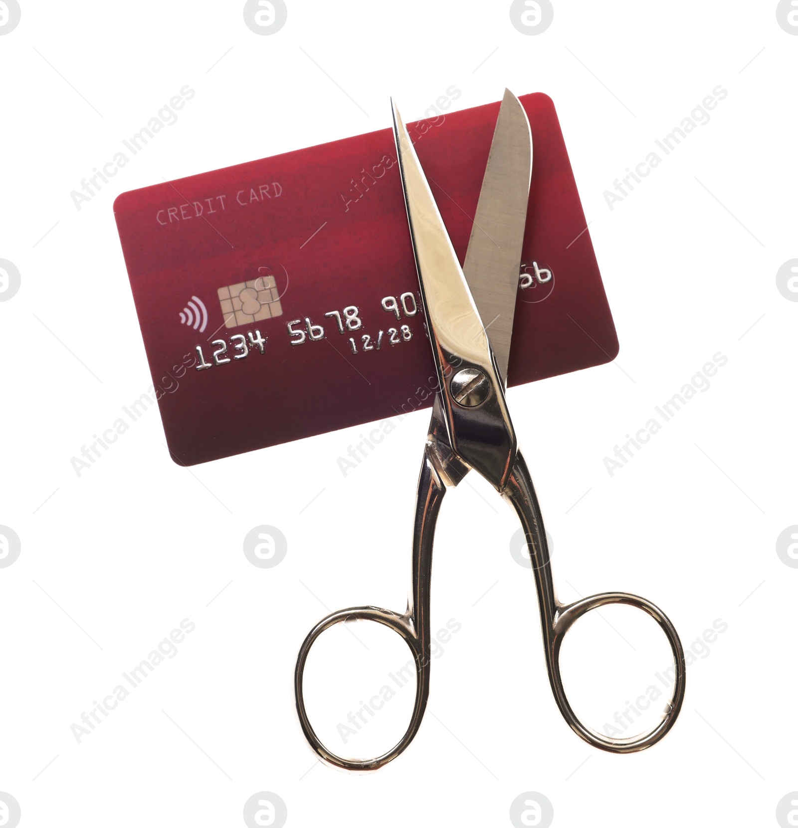 Photo of Credit card and scissors isolated on white