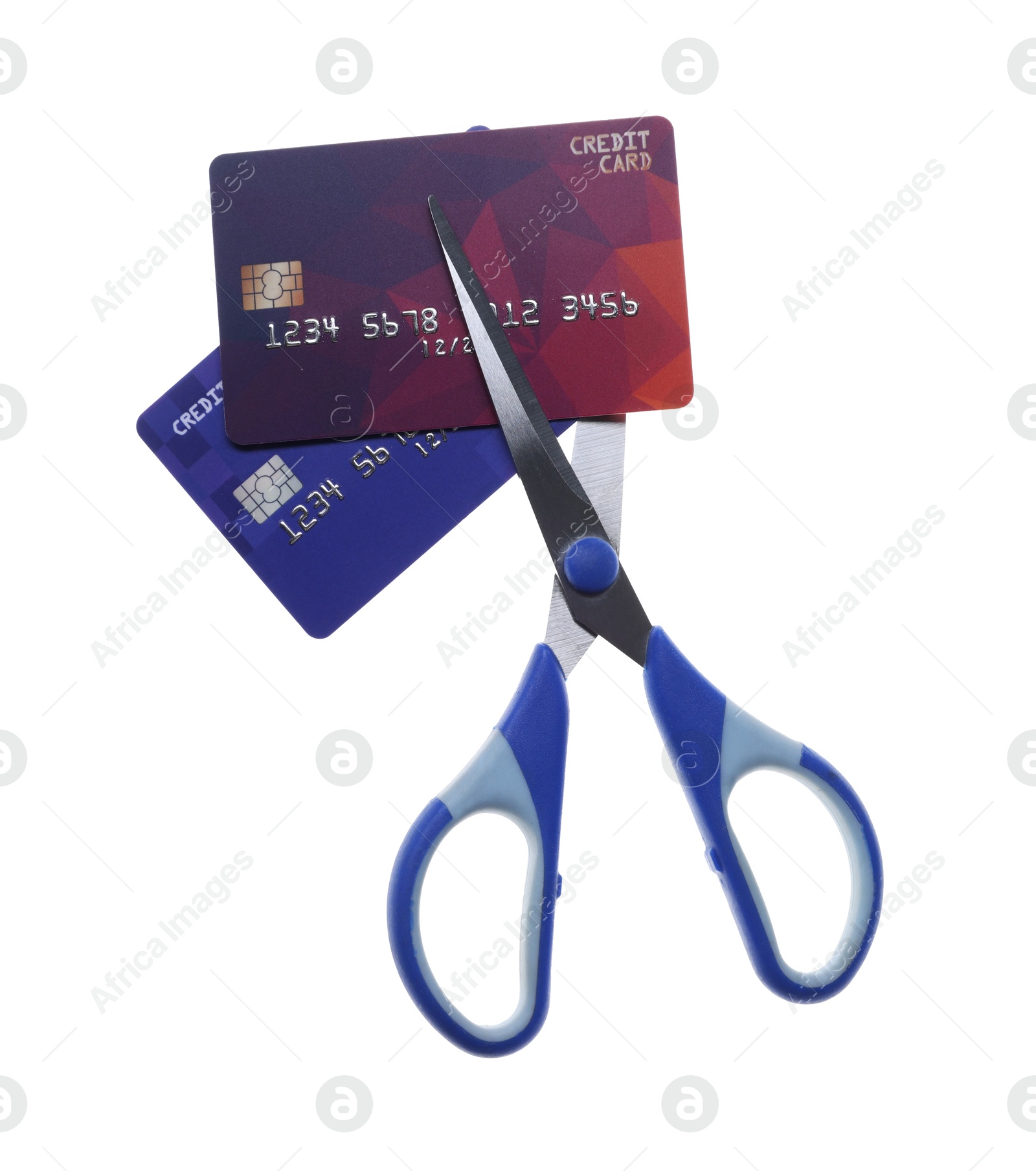 Photo of Credit cards and scissors isolated on white