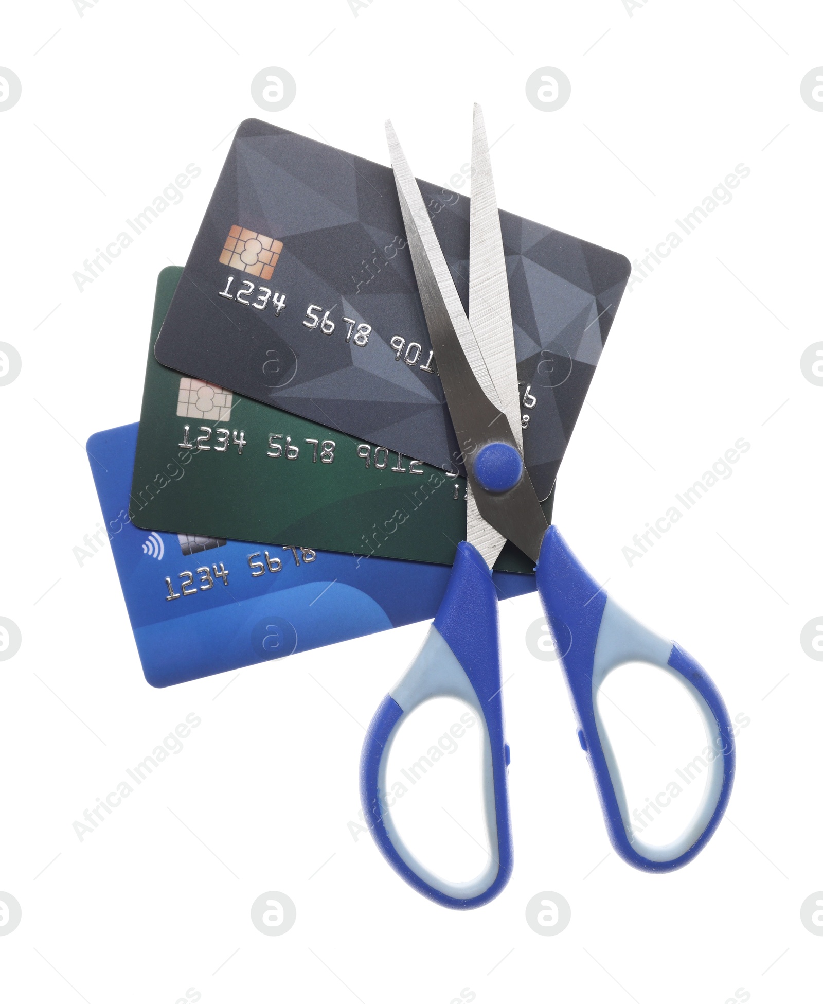 Photo of Credit cards and scissors isolated on white