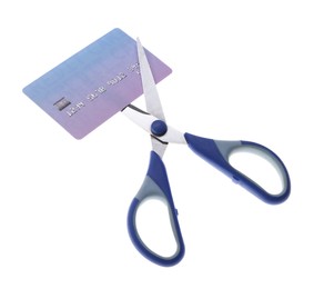 Photo of Credit card and scissors isolated on white