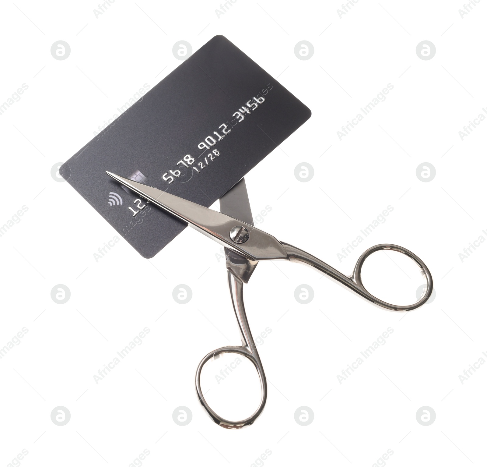 Photo of Credit card and scissors isolated on white