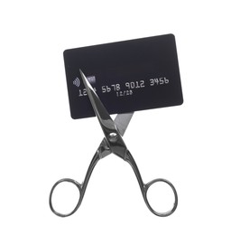 Photo of Credit card and scissors isolated on white