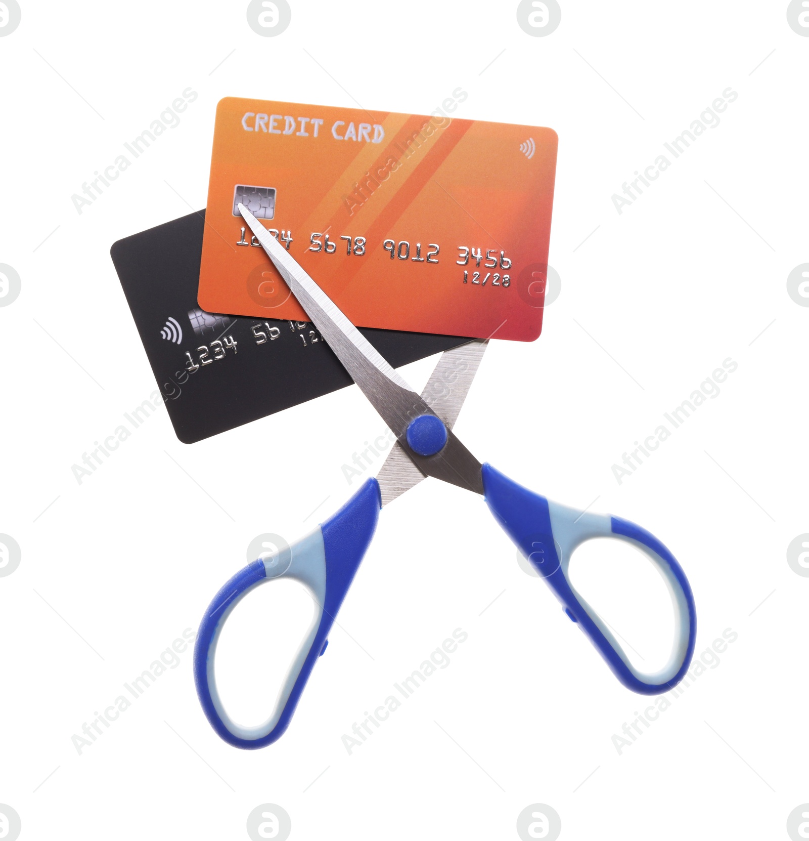 Photo of Credit cards and scissors isolated on white