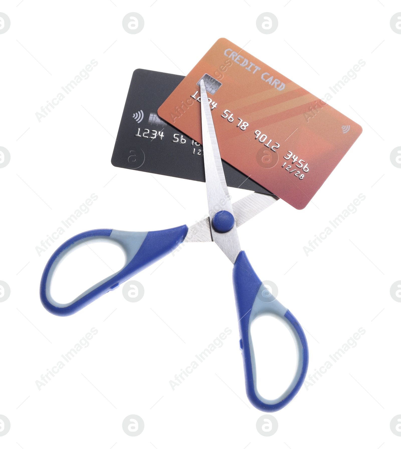 Photo of Credit cards and scissors isolated on white, above view