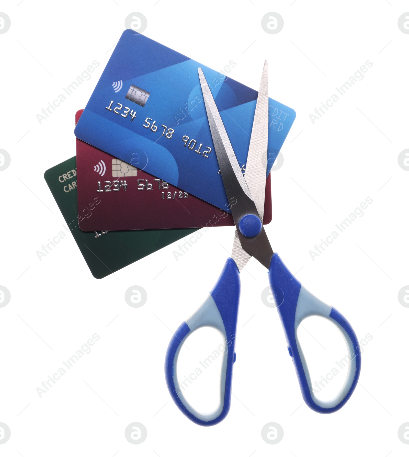 Photo of Credit cards and scissors isolated on white