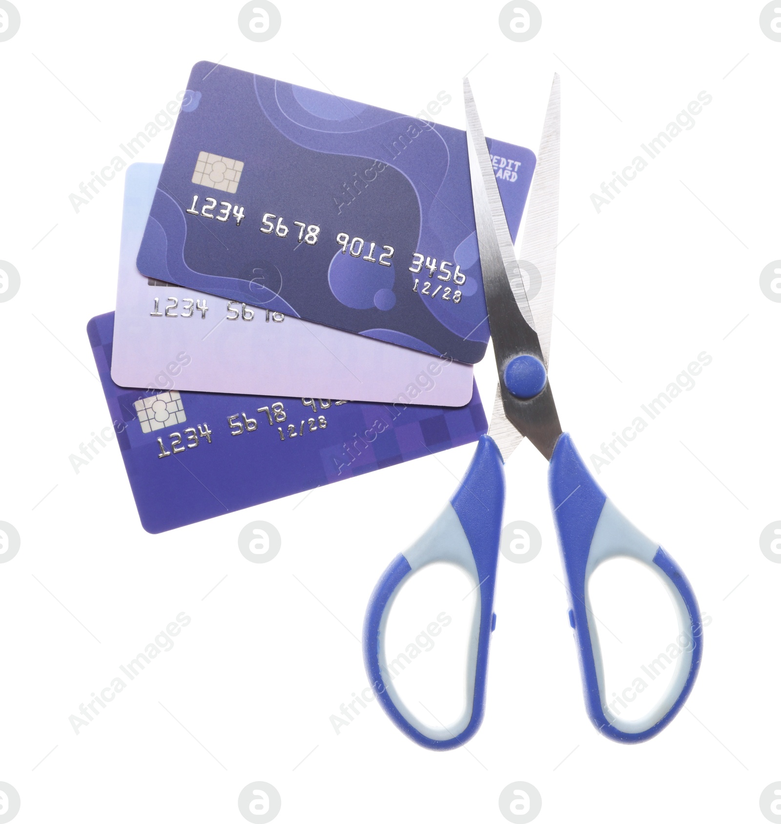 Photo of Credit cards and scissors isolated on white