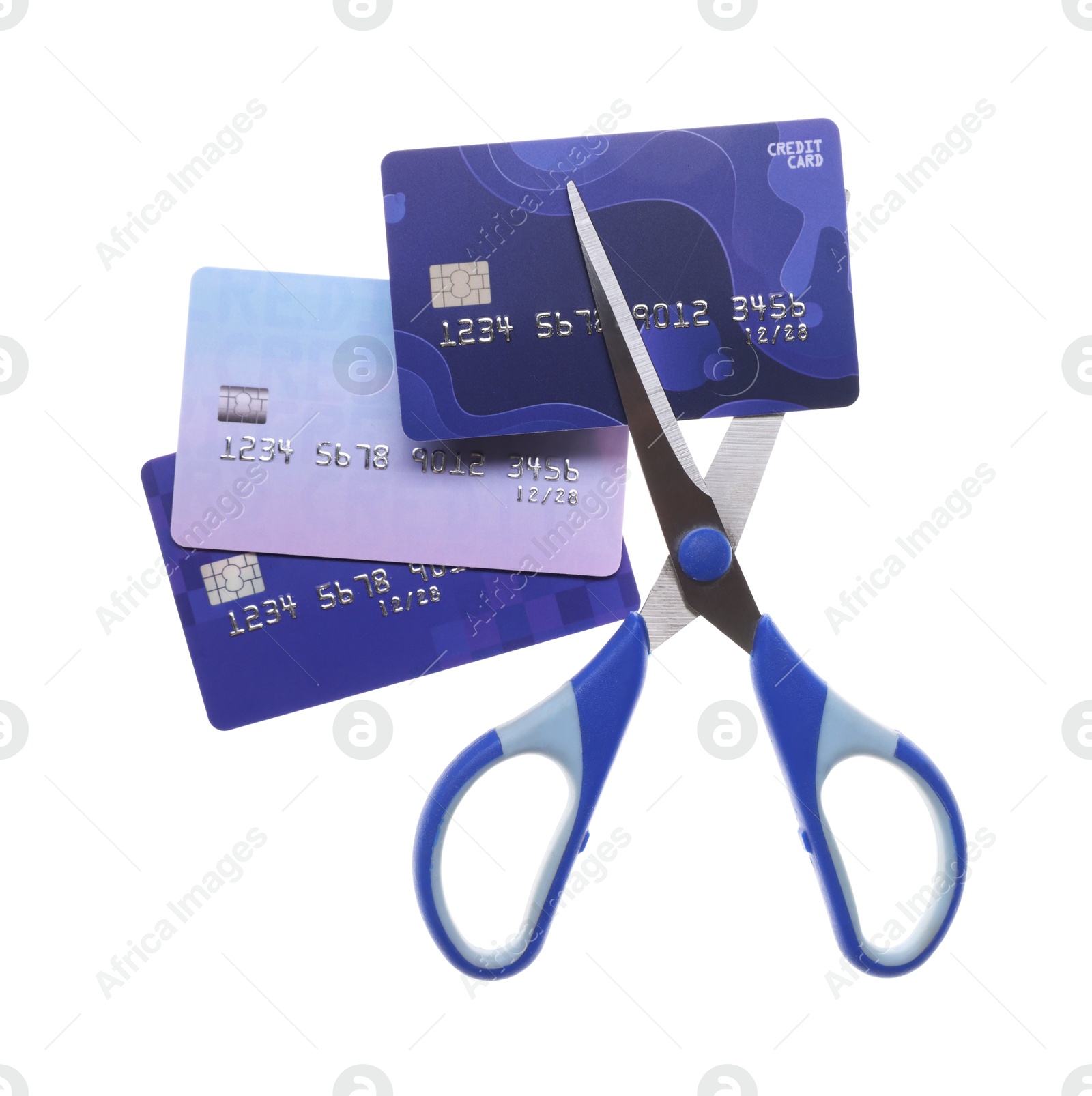 Photo of Credit cards and scissors isolated on white