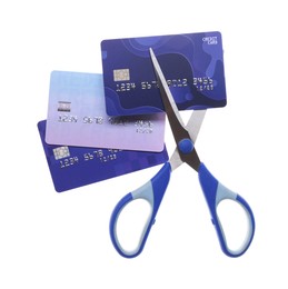 Photo of Credit cards and scissors isolated on white