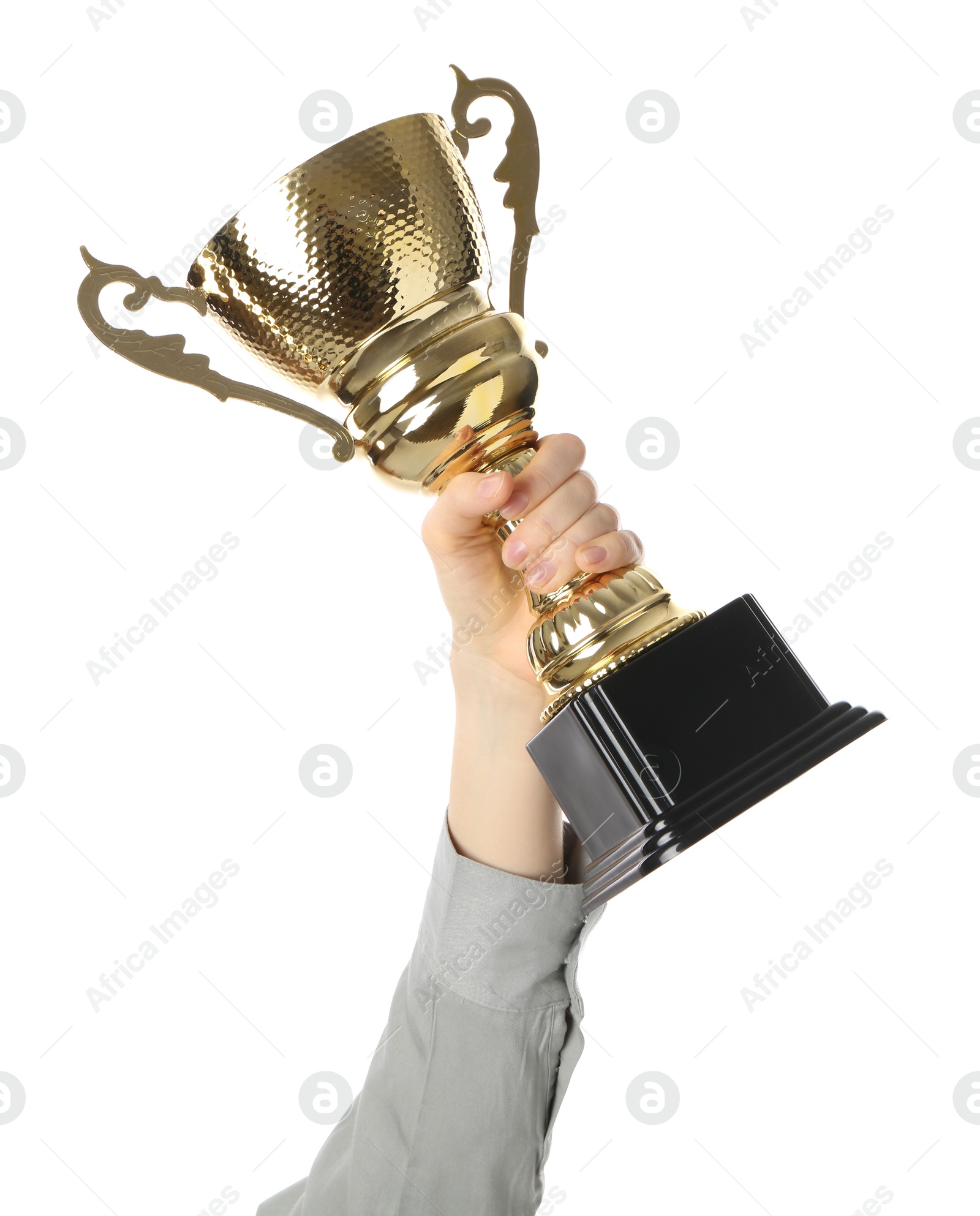 Photo of Woman with golden trophy cup on white background, closeup