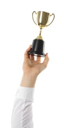 Man with golden trophy cup on white background, closeup