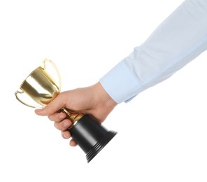 Man with golden trophy cup on white background, closeup