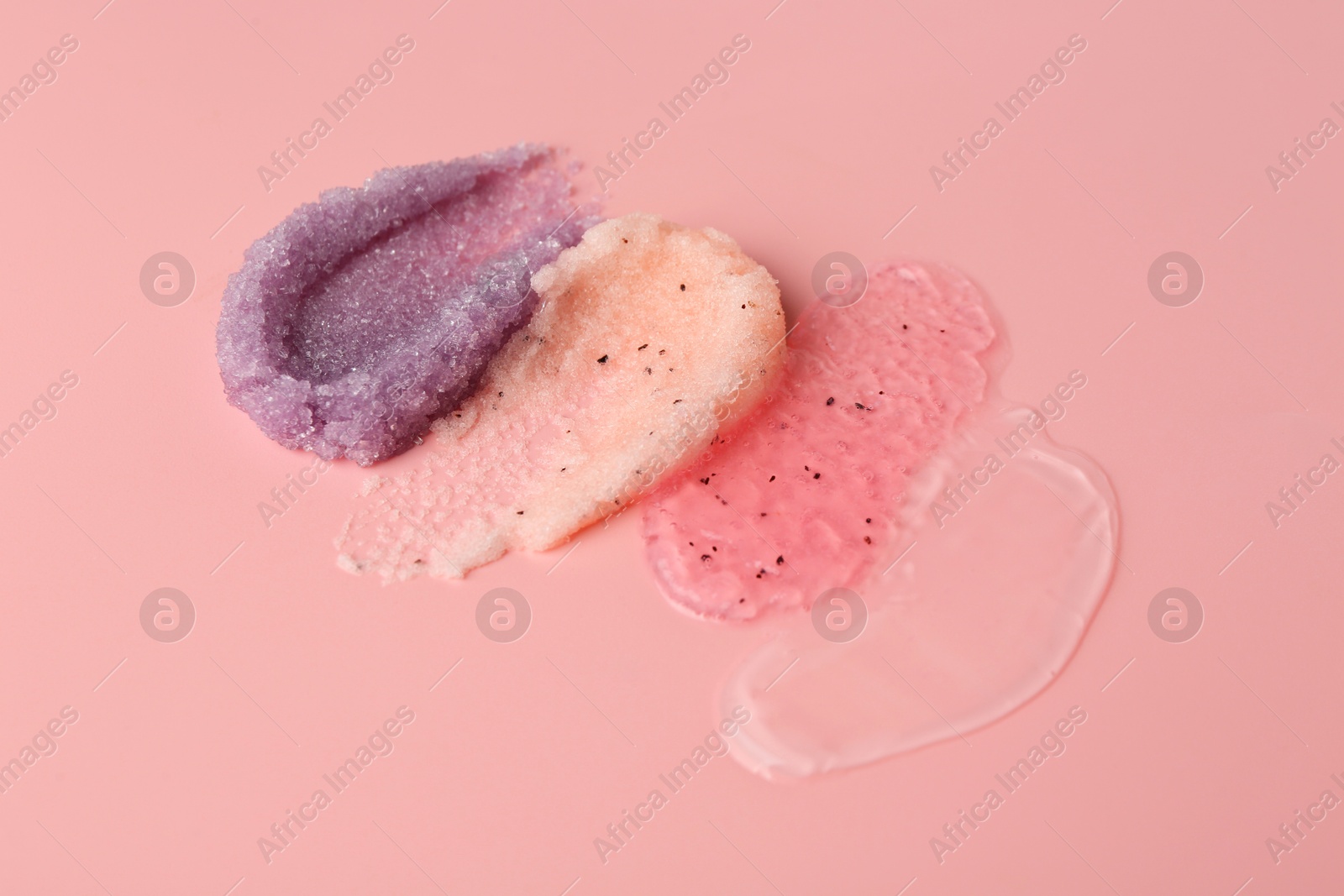 Photo of Samples of cosmetic products on pink background. Skin care